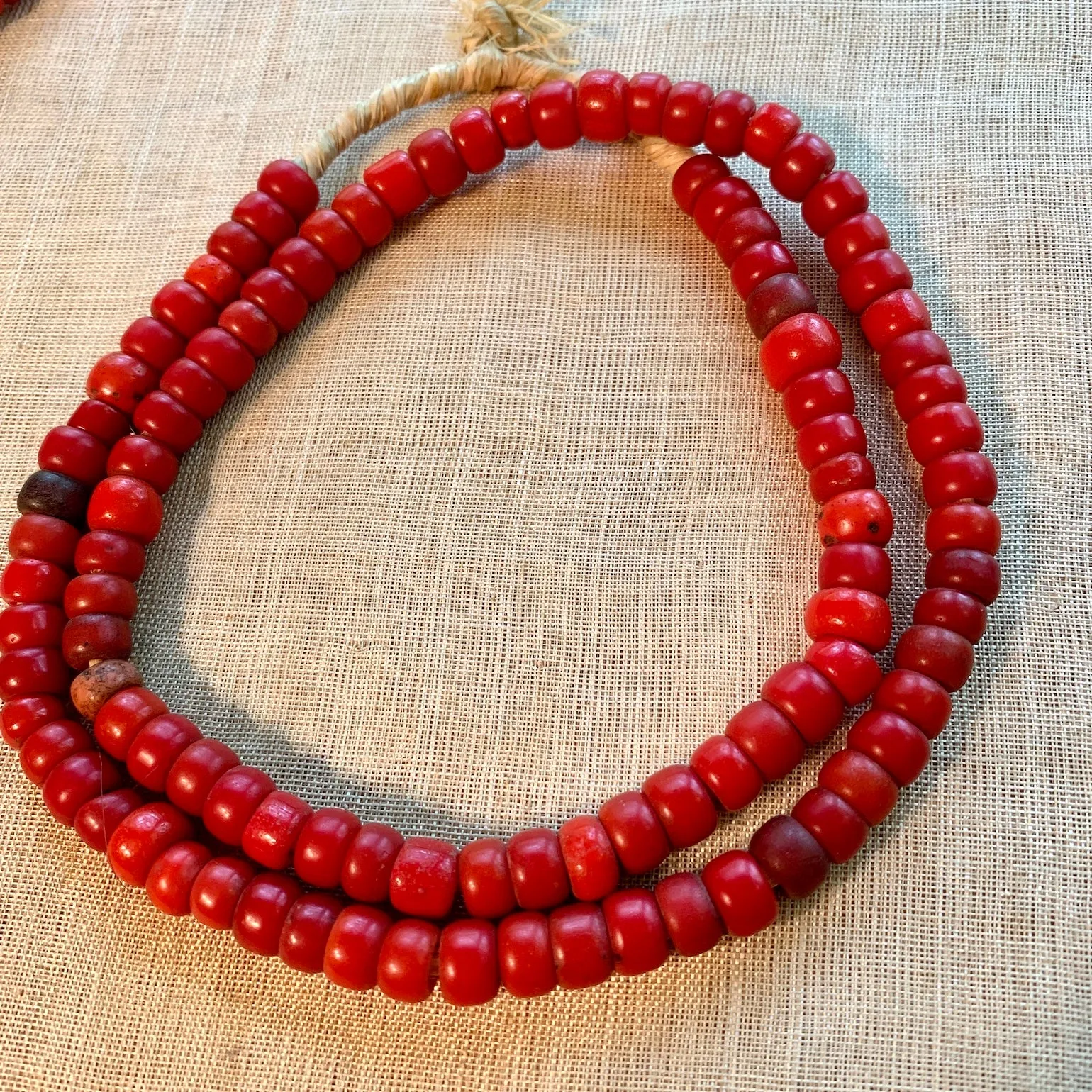 Bright Red Glass Padre Beads, Strand